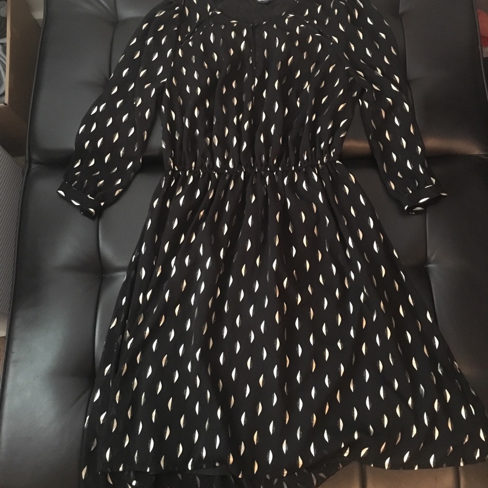 Black long sleeved dress with gold 1/2 moon detail